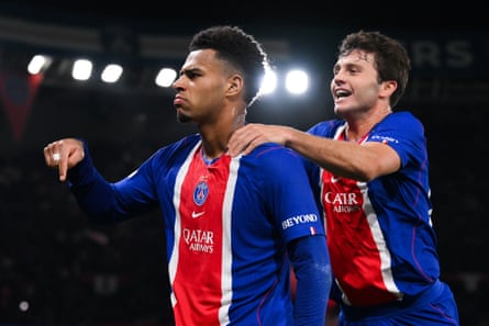 Désiré Doué with João Neves after scoring PSGâÂÂs first goal against Barcelona