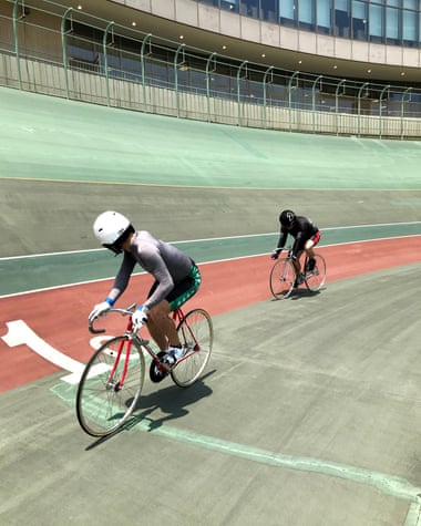 Professional keirin cyclist Ryo Okuhara keeps an eye on Guardian journalist Justin McCurry at the Kawasaki velodrome near Tokyo.