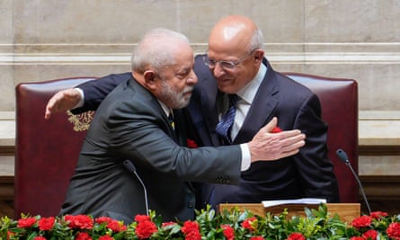 Brazil’s president, Luiz Inácio Lula da Silva (l) greets Augusto Santos Silva,