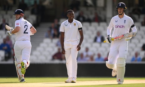 South Africa bowler Kagiso Rabada reacts after England batsman Alex Lees (left) is dropped.