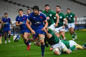 Caelan Doris pulls down Francois Cros before he can put down the ball to score a try.