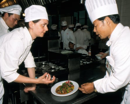 Dunlop making twice-cooked pork with a teacher at the Sichuan Institute of Higher Cuisine, May 2001.