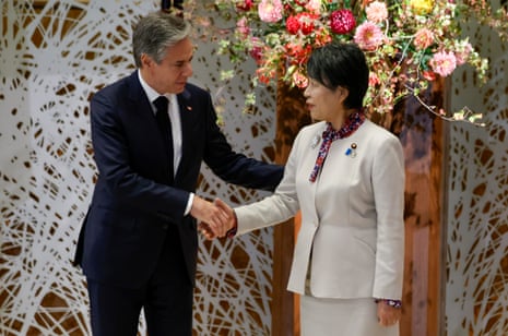 US secretary of state Antony Blinken, left, shakes hands with Japanese foreign minister Yoko Kamikawa in Tokyo.