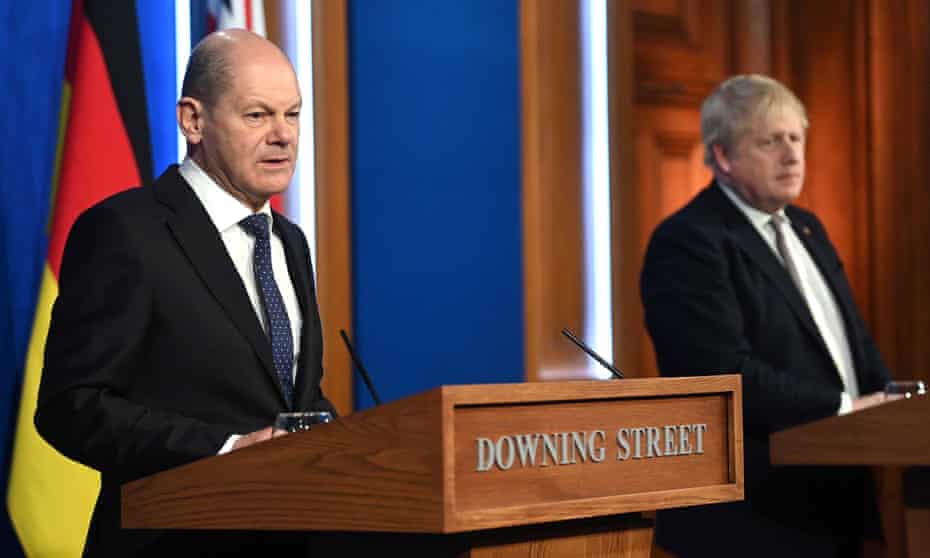Olaf Scholz speaking at a Downing Street press conference, alongside Boris Johnson