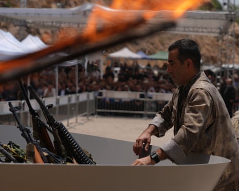 The first group of the Kurdistan Workers' Party (PKK) lays down and destroys their weapons in Sulaymaniyah, northern Iraq on 11 July 2025.