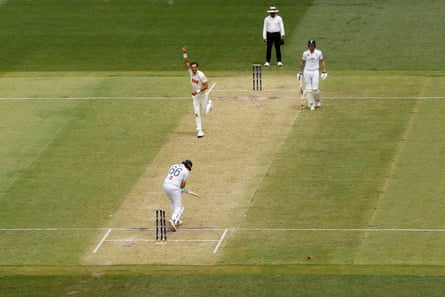 Mitchell Starc of Australia celebrates taking the the wicket of Joe Root on day two of the first Test in Perth.