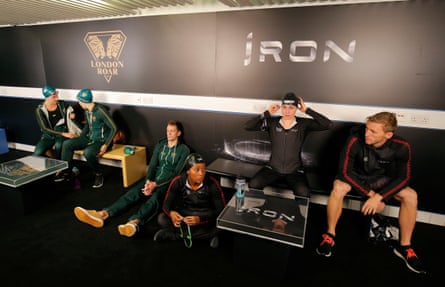Members of London Roar and Team Iron wait for their races.