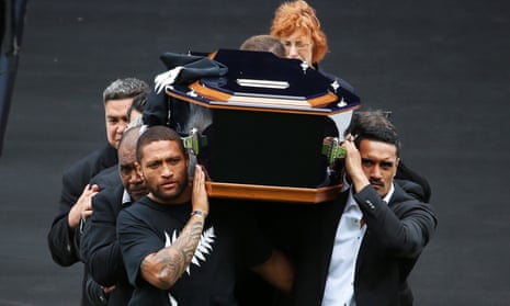 Warrior Manu Vatuvei (L) and All Black Jerome Kaino (R) lead the pall bearers carrying Jonah’s casket from the field at the Public Memorial for Jonah Lomu.