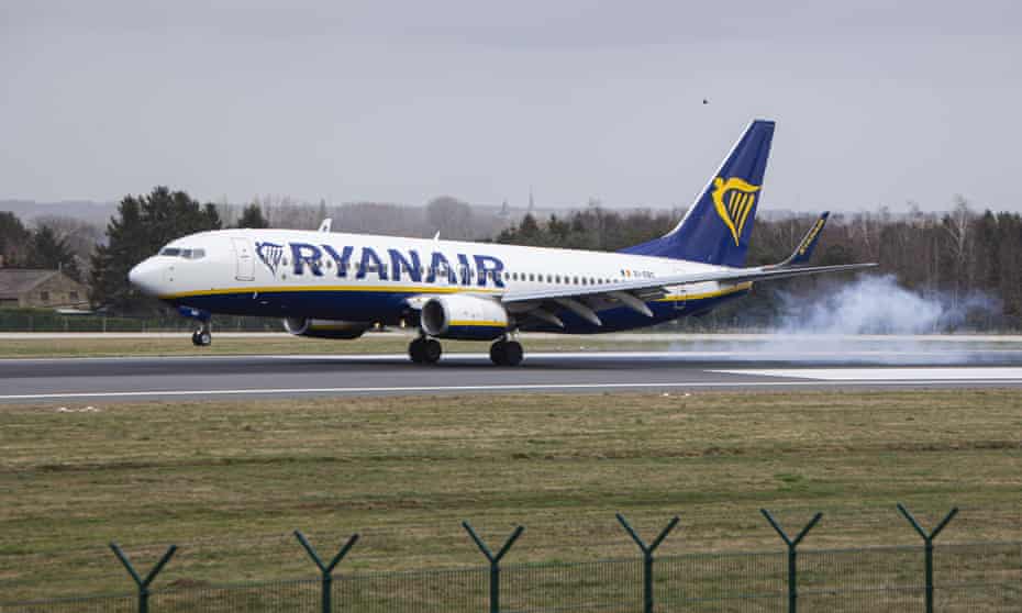 Ryanair aircraft landing at airport.