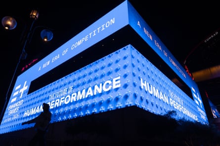 A person walks past an advertisement for the Enhanced Games in Las Vegas