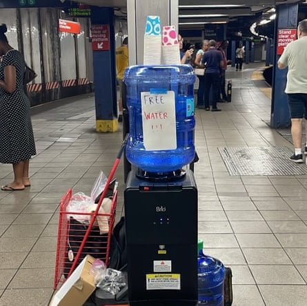 A water cooler on a subway platform.