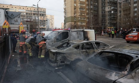 Emergency workers at the site of a Russian missile strike, amid Russia’s attack on Ukraine, in Kyiv, Ukraine 9 March 2023.
