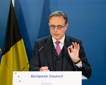 Kaja Kallas at a podium in a suit