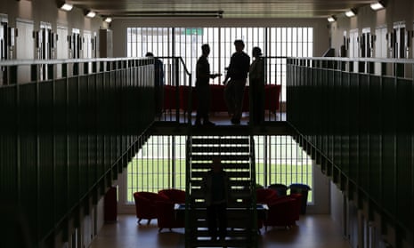 Prisoners congregate in a cell area at HMP Berwyn in Wrexham, Wales. 