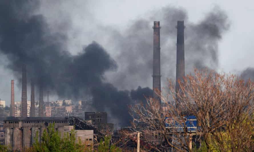 Smoke rises above a plant of Azovstal steelworks in Mariupol