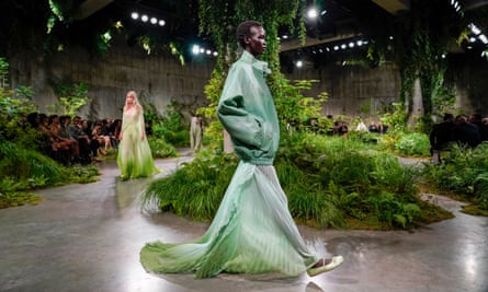 Models in sheer green gowns