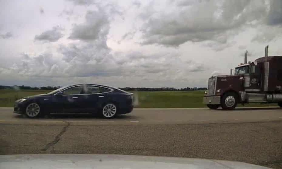 This police image shows the Model S Tesla driving on the highway near the town of Ponoka in Alberta.