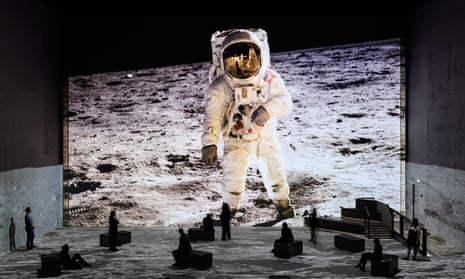 A huge image of an astronaut on the moon in The Moonwalkers: A Journey With Tom Hanks.
