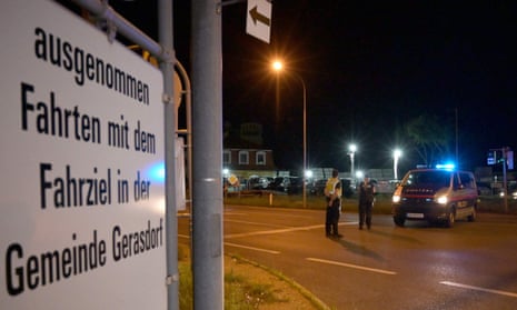 Police blocks a street near the site of the shooting in Gerasdorf, near Vienna, on Saturday