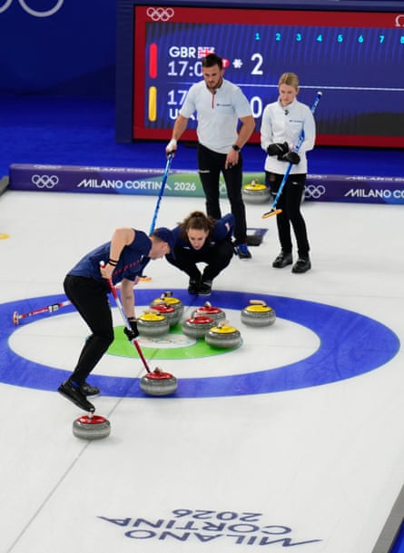 Britain’s Bruce Mouat and Jennifer Dodds compete against the USA’s Korey Dropkin and Cory Thiesse