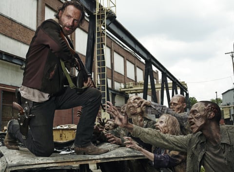 Andrew Lincoln (left) in season five of The Walking Dead.
