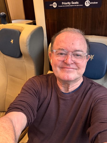 Whitlam smiling as he takes a selfie