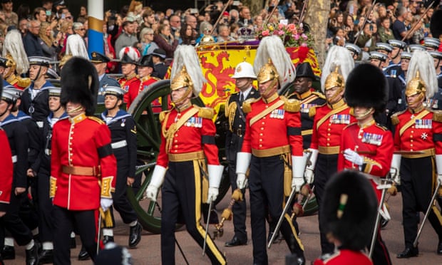 ‘Ritual and religion, pageantry and power, all are first cousins to theatre.’ The Royal Household Cavalry and members of the navy escort the coffin of Queen Elizabeth II along Whitehall.