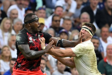 Levani Botia clashes with England’s Tom Curry during the 2023 World Cup quarter-final.
