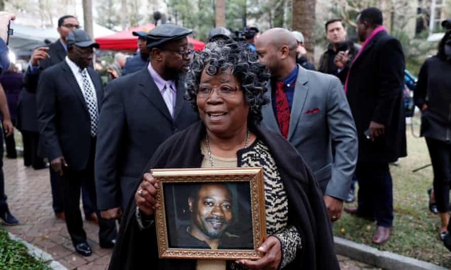 Judy Scott holds a photo of her son, Walter Scott, in Charleston, South Carolina Thursday.