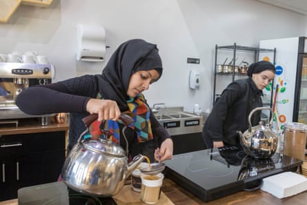 a person pouring tea