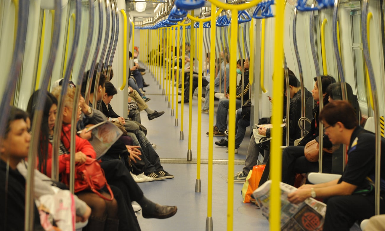 Passengers on a Hong Kong metro train. The MTR is one of the few public transport operators to make a profit. 