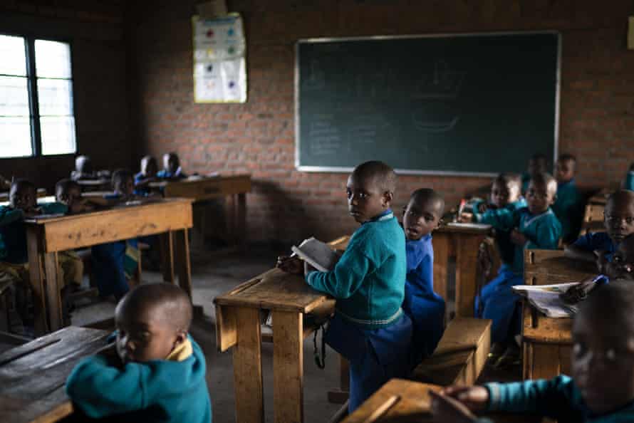Children attend class at the Nyabitsinde primary school near the Volcanoes national park in Kinigi, Rwanda.