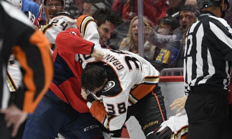 Garnet Hathaway fights Anaheim Ducks center Derek Grant during Monday night’s game