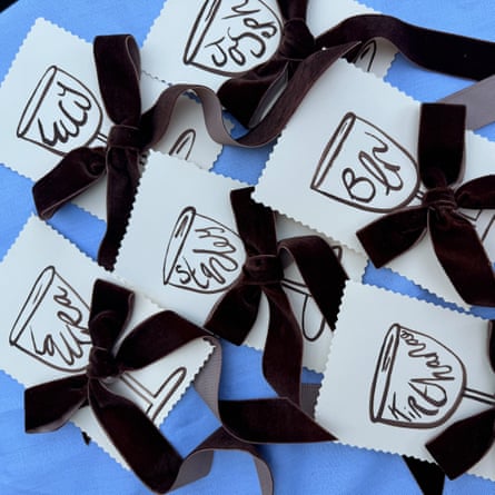 Hand-painted menus by Laura Jackson.