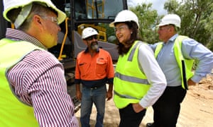 Queensland premier Annastacia Palaszczuk embraces hi-vis publicity while inspects the construction work of Riverway Drive in Townsville on Monday.