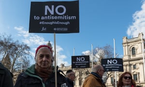 Protesters campaign against antisemitism within the Labour party in Parliament Square in London.