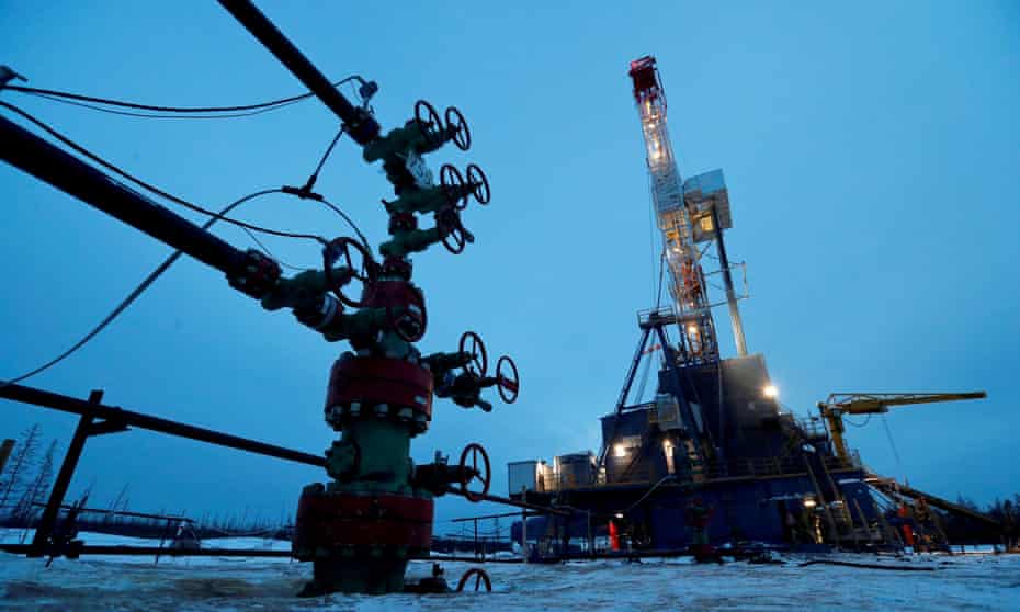 A well head and drilling rig in the Irkutsk region of Russia