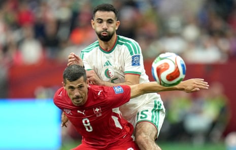 Remo Freuler and Rayan Ait-Nouri eye the ball.