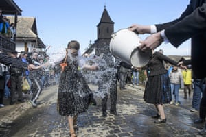 Dressed in folk costumes, young men pour water on young women in a mountain northeast of Budapest. According to a several hundred years old tradition of Hungarian villages young men pour water on young women who in exchange present their sprinklers with beautifully coloured eggs on Easter Monday