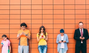 People of all generations texting on their smartphones