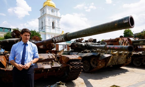 Trudeau at an exhibition of destroyed vehicles in Kyiv, Ukraine.