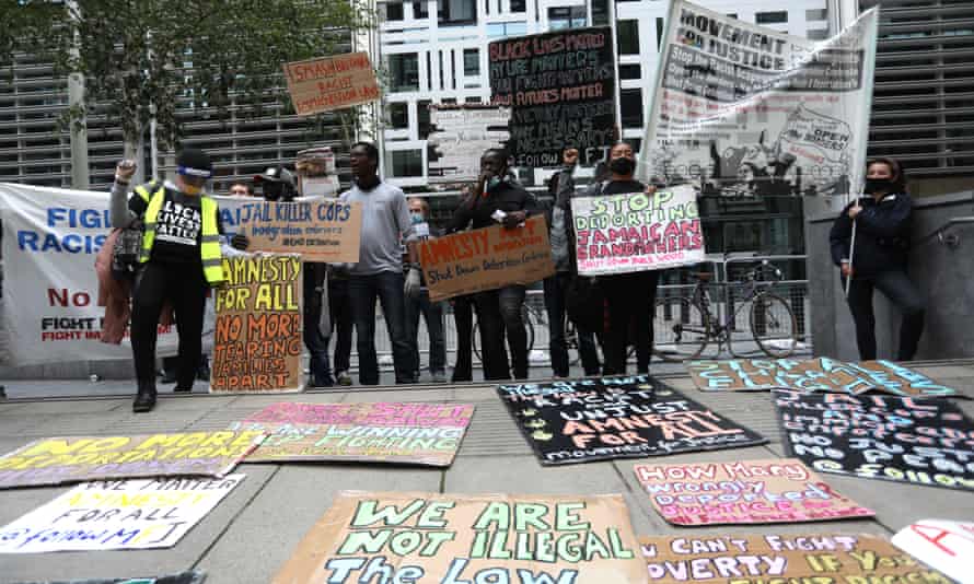 Demonstrators protest against deportation and detention centres outside the Home Office in central London