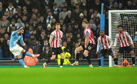 Rayan Cherki fires home from outside the penalty area to give Manchester City the lead.