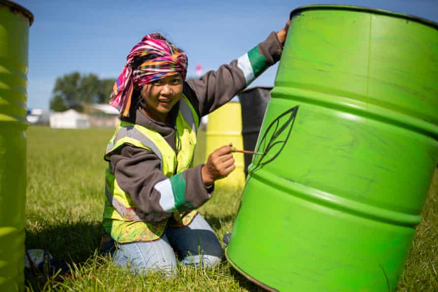 Ameli ‘Ae’ Westbrook, a Thai volunteer, travelled all the way from Southeast Asia to paint bins