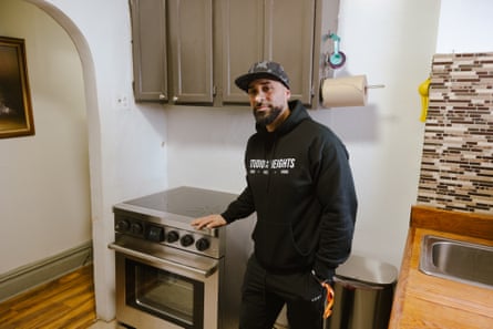 a man stands by his new induction stove