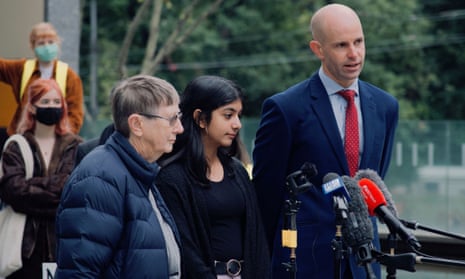 School student Anj Sharma outside the federal court in Melbourne, with lawyer David Barnden and Sister Brigid Arthur.