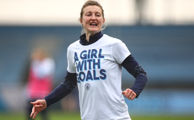 Ellen White warms up in a T-shirt reading A Girl With Goals for 2021 International Women’s Day