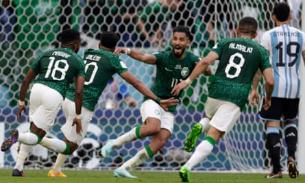 Saleh Al-Shehri of Saudi Arabia celebrates scoring the equalizer against Argentina on the way to the historic Saudi win.