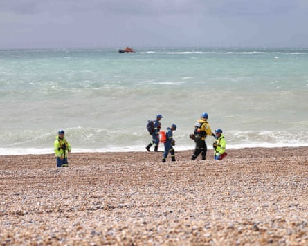 Members of a search and rescue team on Brighton beach on 13 May.