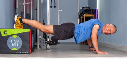 Simon Lord in press-up position in his gym
